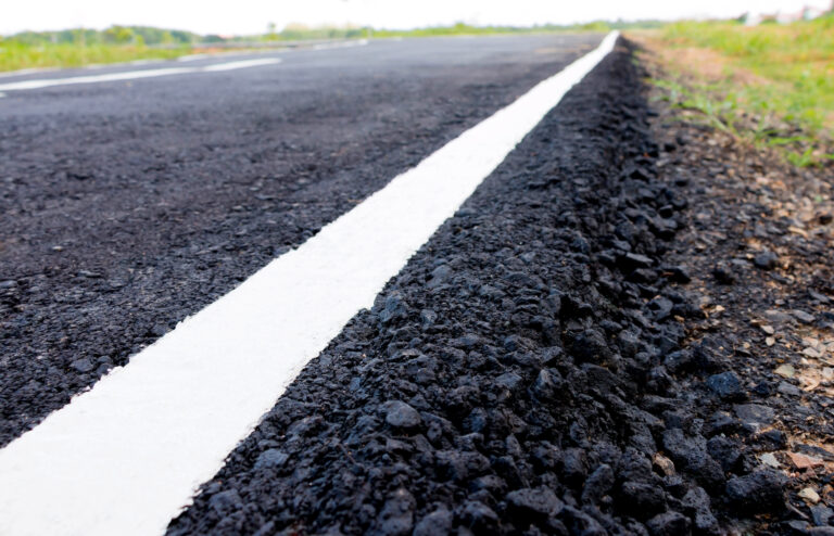 closeup new asphalt road in countryside